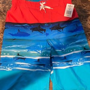 Brand new boys XL 18-20 surf shorts.